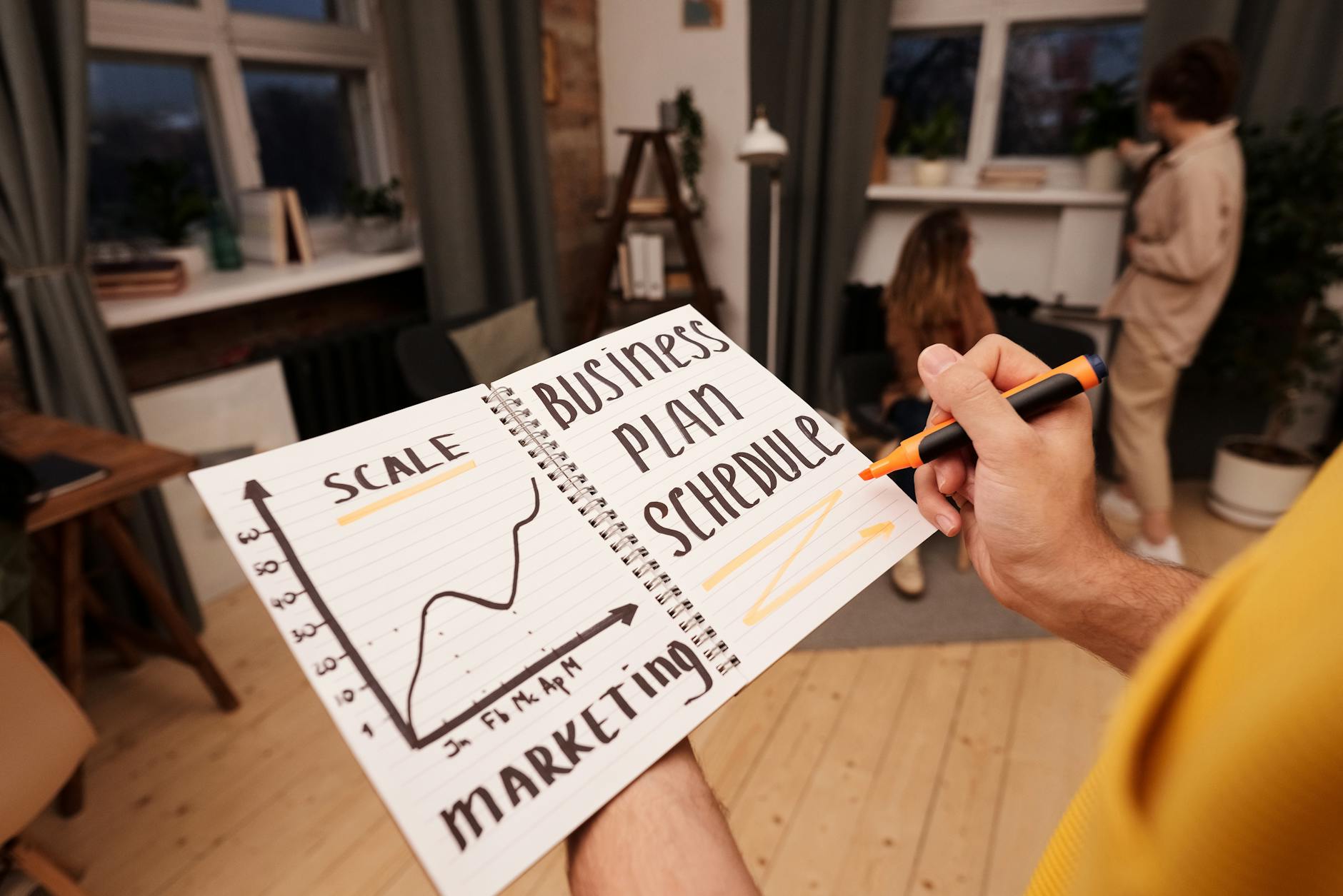 a person holding a pen